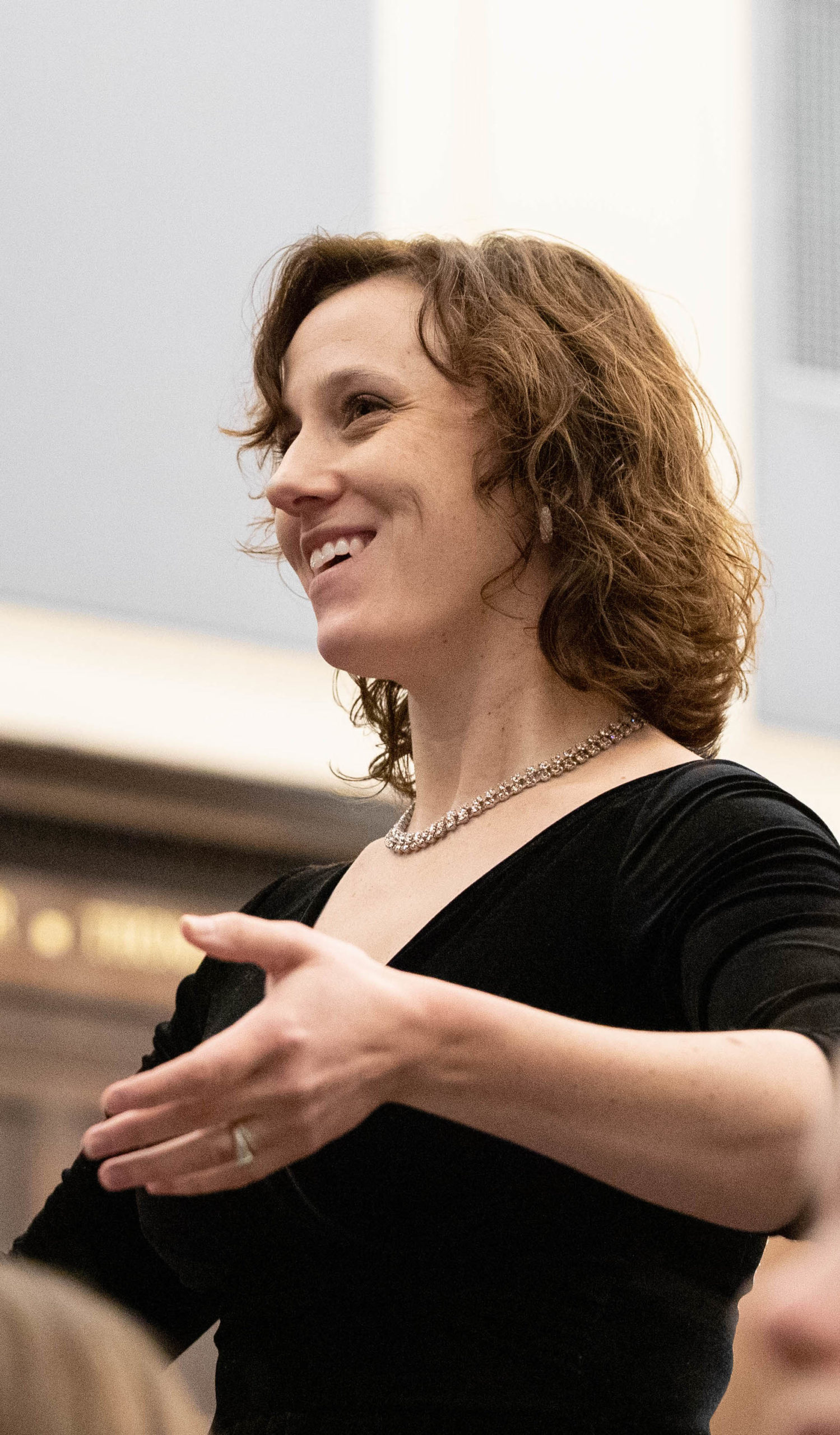 Conductor Alyson Greer Espinosa conducting