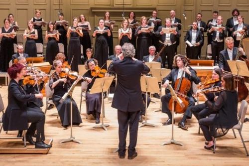 Artistic Director Harry Christophers conducting the Orchestra and Chorus