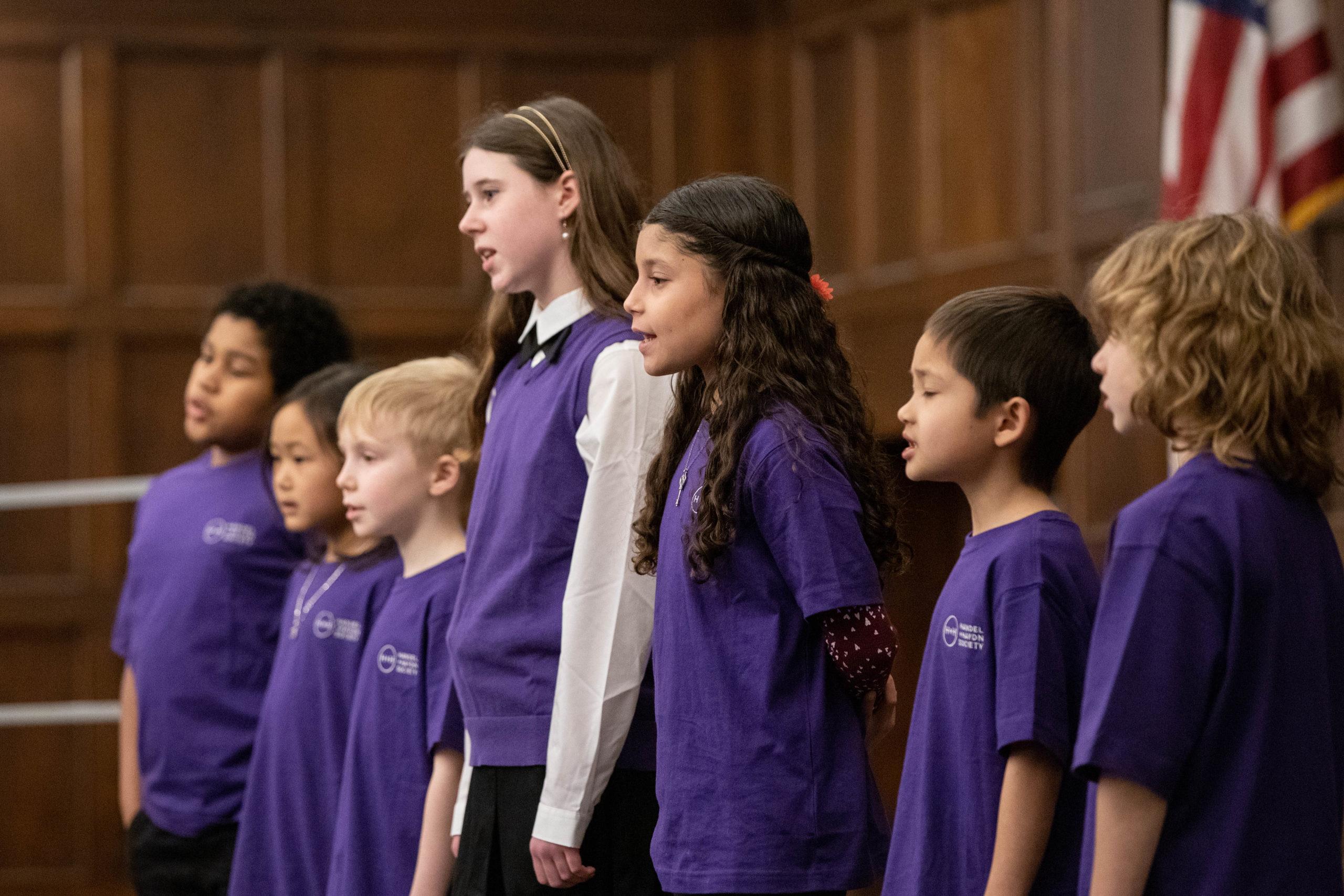 A group of young students singing