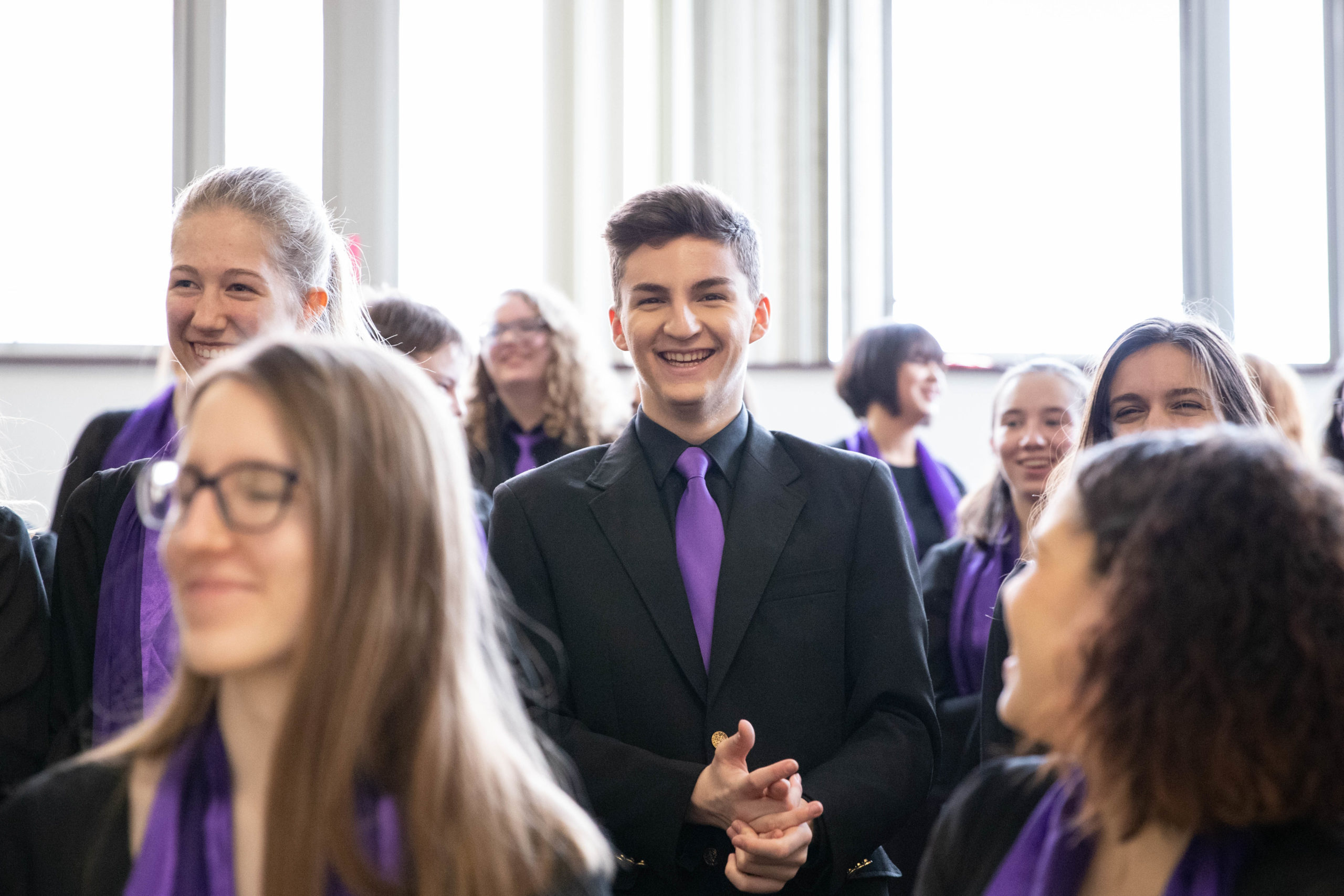 49248277712_1475284222_5k A young male student smiling