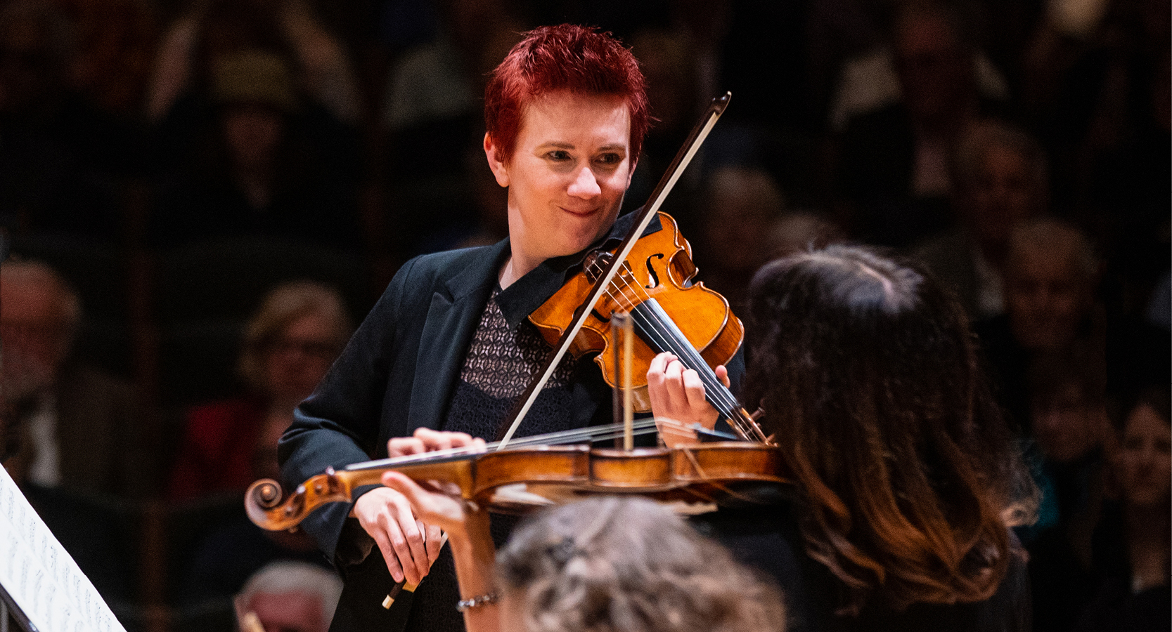 Concertmaster Aisslinn Nosky playing