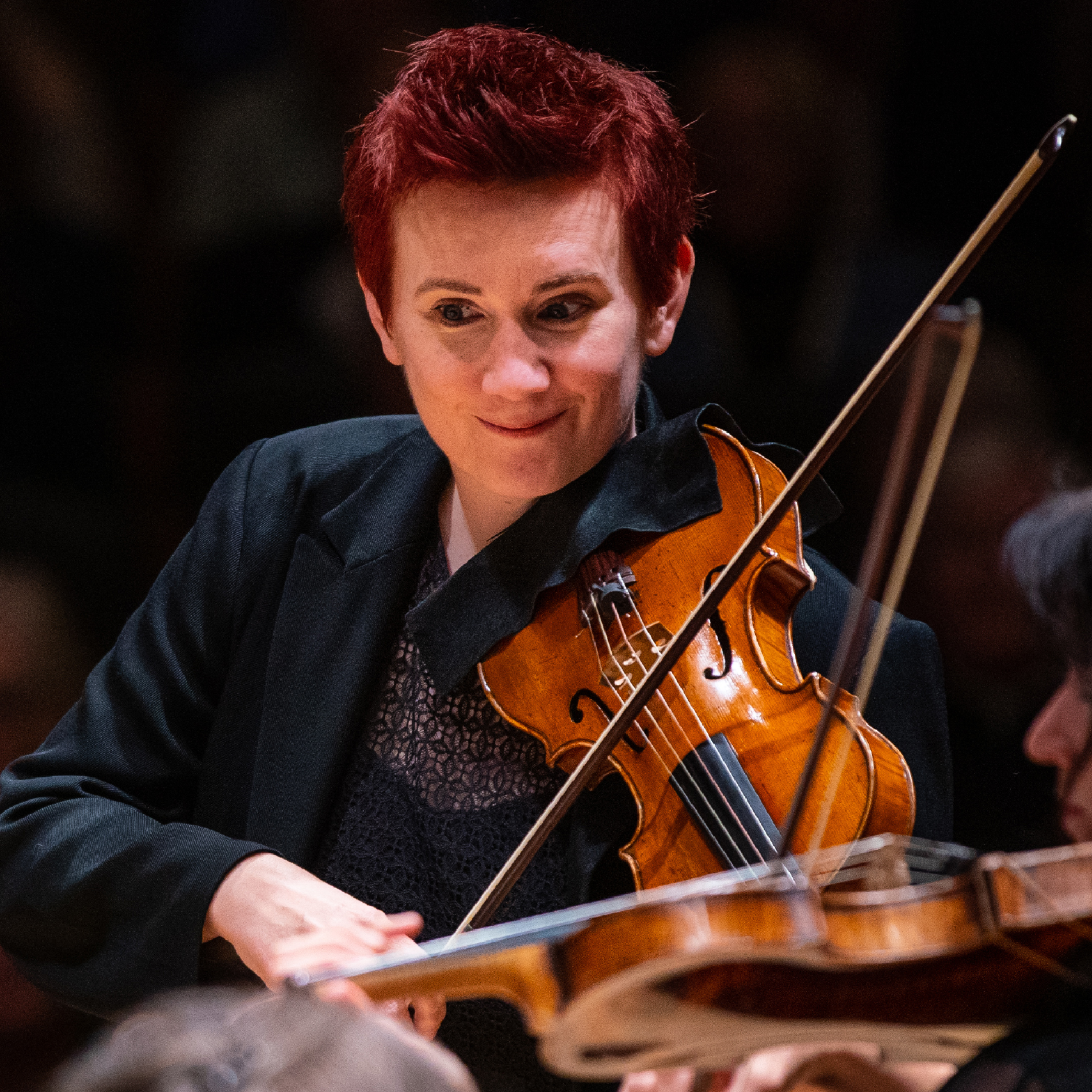 Concertmaster Aisslinn Nosky playing