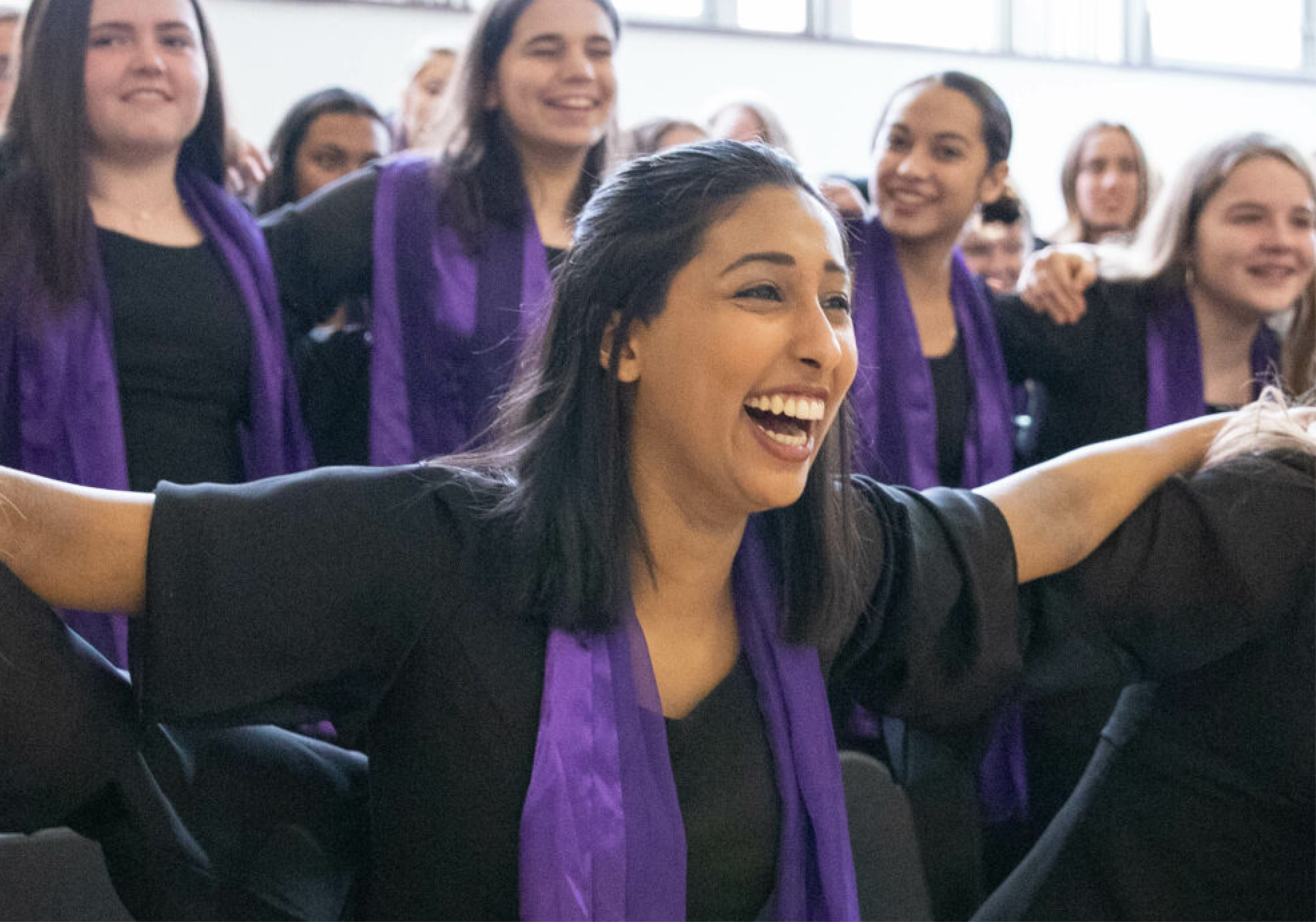 Young female student smiling in choir